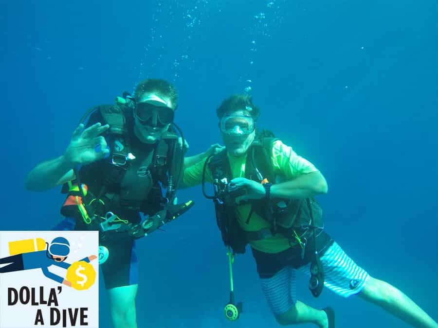 Two divers taking part in a Belize fundraising dive